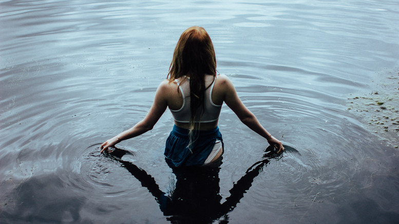 Woman in ice water